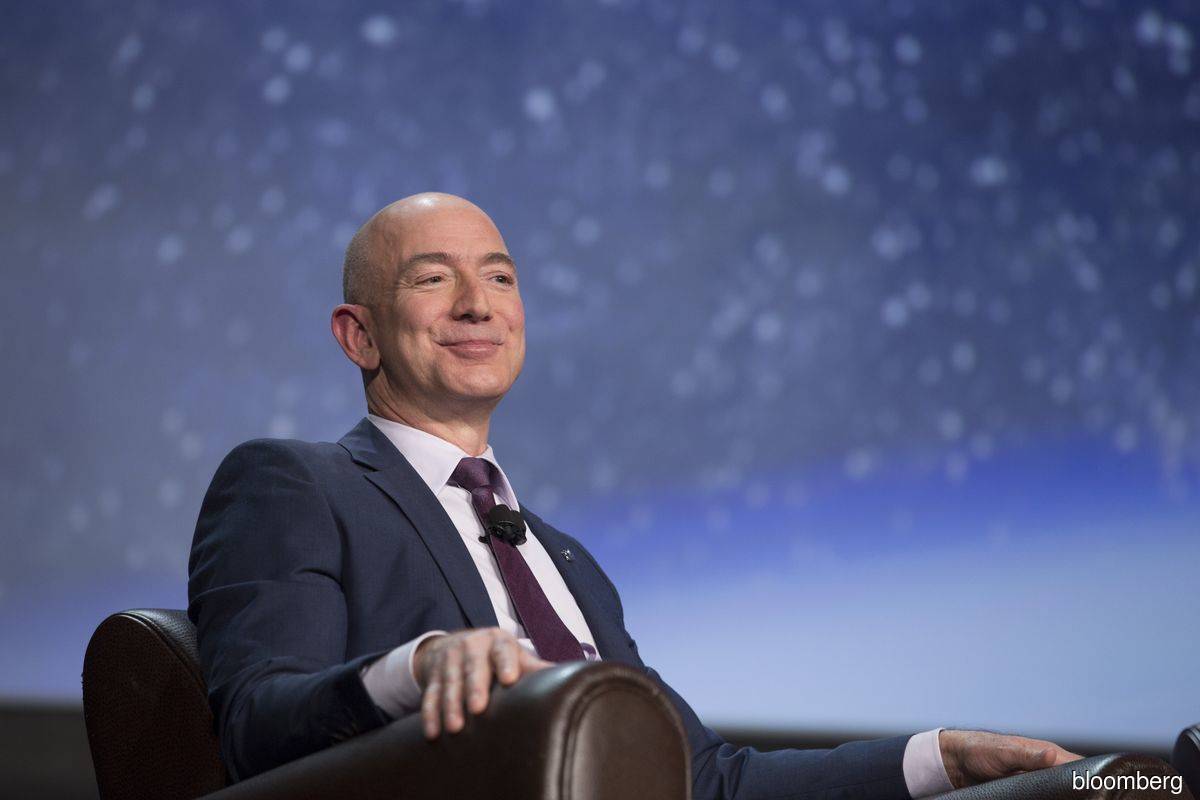 Bezos (pictured) and Amazon were frequent Twitter targets of former US president Trump, who often tried to blunt critical investigative stories by the Bezos-owned Washington Post by attributing them to his personal feud with Bezos. (Photo by Bloomberg)